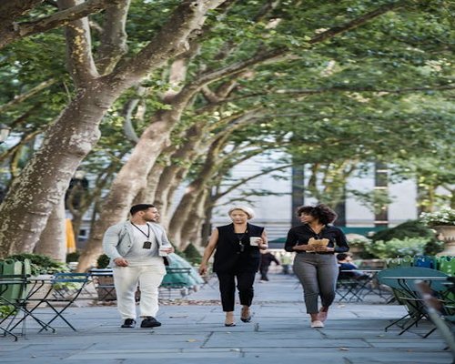 Man walking in park during lunch break